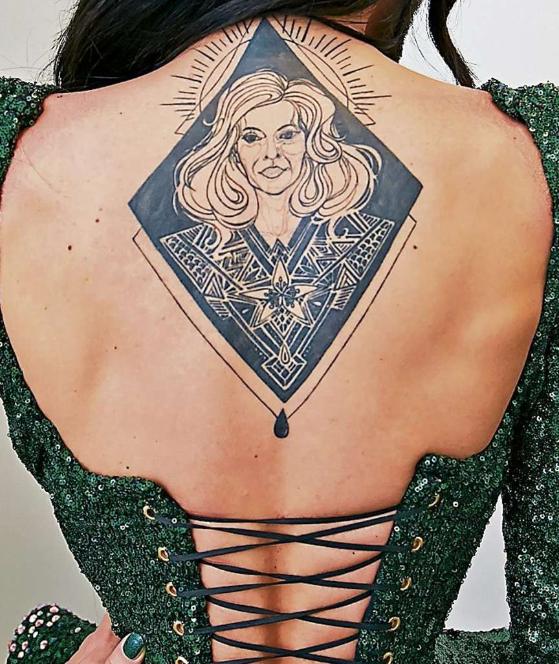 conchita wurst tattoo back mother helga
