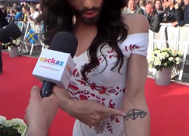 what-do-conchita-wurst-s-tattoos-signify-why-did-she-get-them-leo-sigh